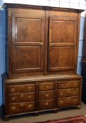 18th century oak housekeeper's cupboard, moulded corners over two double panelled doors and the base