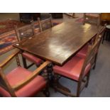 20th century small oak refectory style dining table with panelled top, turned baluster end supports,