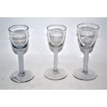 Group of three mid-18th century wine glasses with air twist stems (3)