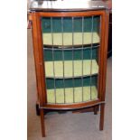 Small Edwardian mahogany display cabinet with single line inlaid, lead glazed bow front door,
