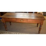 Stained pine kitchen table, of rectangular form with single frieze drawer raised on turned supports,