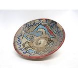 Flared pottery Islamic bowl decorated with a horse and geometric design, 14cm diam