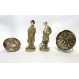 Pair of late 19th century Satsuma figures of a gentleman and a lady (a/f), together with two small