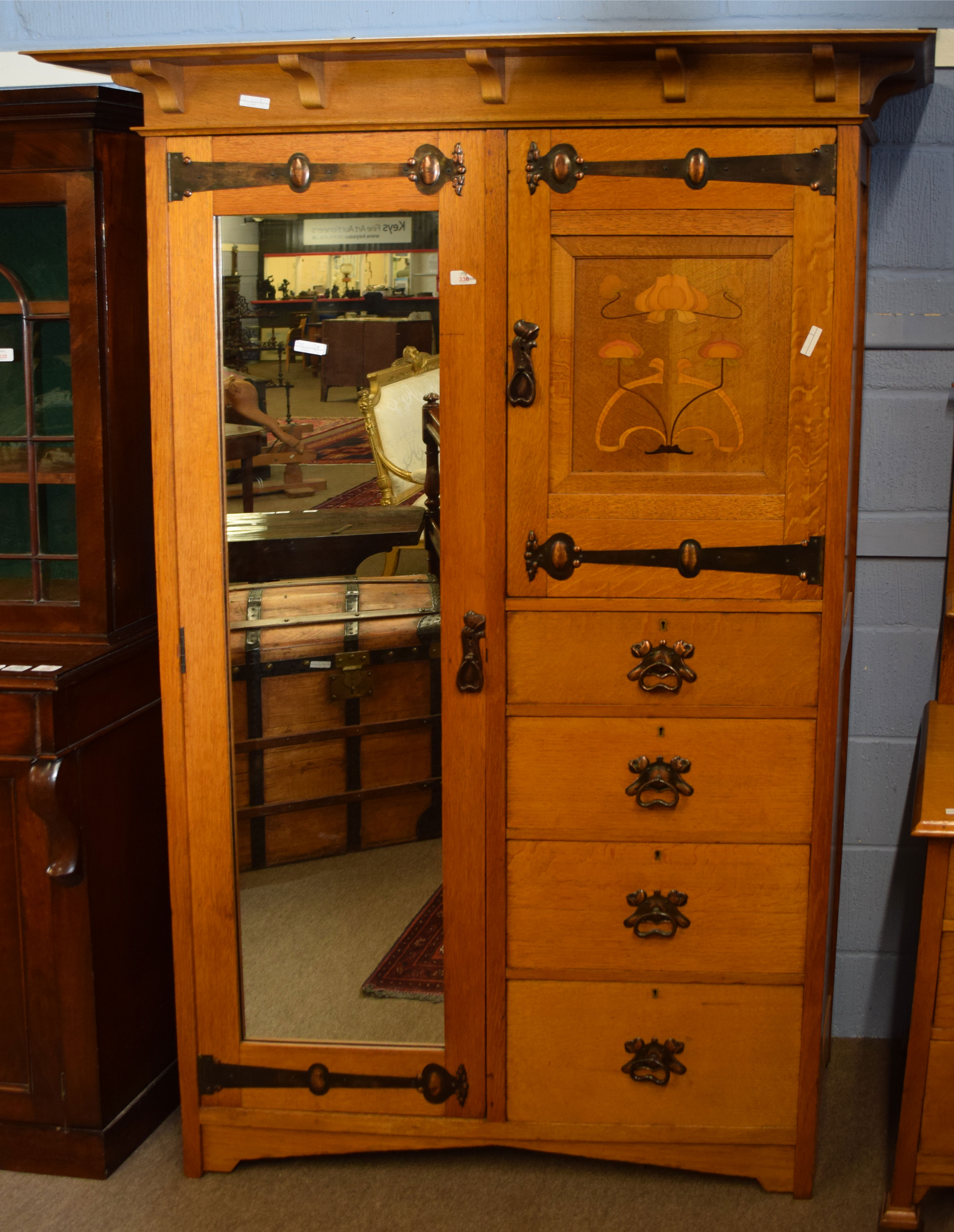 Early 20th century Art Nouveau oak wardrobe having a spreading balustraded pediment over a single - Image 2 of 6