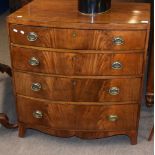 Late Georgian mahogany bow front chest of four graduated drawers with embossed oval brass handles,
