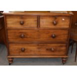 Small Victorian mahogany chest of two and two drawers with turned handles and feet, width 96cm x