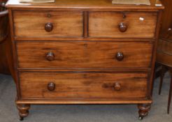 Small Victorian mahogany chest of two and two drawers with turned handles and feet, width 96cm x