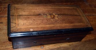 Late 19th century rosewood and ebonised cased music box with cylinder movement (7 teeth missing),