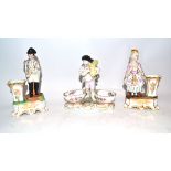Continental porcelain salt figure in Meissen style, together with two further Continental
