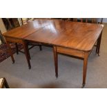 Georgian style mahogany D-end dining table with single centre leaf and brass clips, raised on