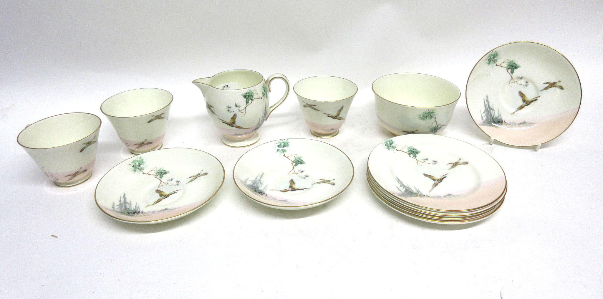 Quantity of Royal Doulton tea wares in the Coppice pattern with cups and saucers in an Art Deco