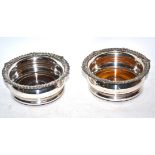 Pair of silver plated wine coasters