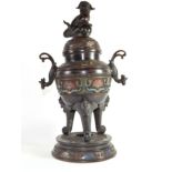 Large metal bronzed jar and cover with lion finial, decorated in cloisonne style, standing on