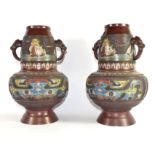 Pair of Oriental vases with cloisonne type decoration with elephant head handles, 33cm high (2)