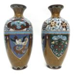 Pair of cloisonne vases with typical decoration of birds and geometric devices, 20cm high (2)