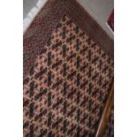 Modern Caucasian carpet, multi-gull border, central panel of geometric designs, mainly brown field