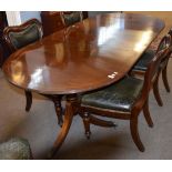 Regency style mahogany twin pedestal dining table, oval shaped, and featuring an inset leaf, top