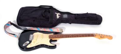 Squier by Fender Stratocaster with gig bag.