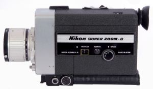 Nikon Super Zoom 8mm camera in hard case.