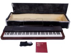 Yamaha PF15 Electronic Piano with wooden flight case.