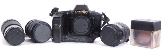 Canon T90 film camera with Vivitar 35-70mm lens and Vivitar 70-210mm lens and accessories.