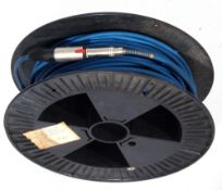 Reel of instrument cable.