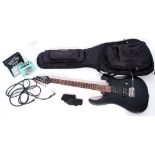 Cort X100 Open Pore Black guitar with gig bag, including HoneyTone mini-amp.