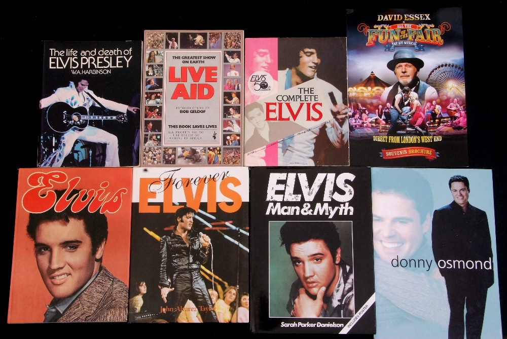 Small collection of music books to include 'Live Aid: This Book Saves Lives', 'Forever Elvis' etc.