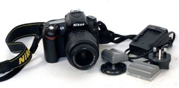 Nikon D90 with Nikkor 18-55mm 1 : 3.5-5.6