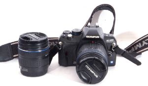 Olympus E-420 with 45-150mm lens and 14-42mm lens.