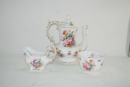 COFFEE POT, MILK JUG AND SUGAR BOWL WITH FLORAL DECORATION BY HAMMERSLY