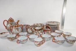 QTY OF KUTANI WARES INCLUSING TEAPOT AND COVER, TWO JUGS, QTY OF SIDE PLATES CUPS AND SAUCERS AND