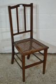 EARLY 20TH CENTURY CANE SEATED BEDROOM CHAIR WITH STRUNG DECORATION APPROX WIDTH 34CM