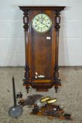 MAHOGANY CASED VIENNA TYPE WALL CLOCK WITH EAGLE CREST BRASS MOUNTED ROMAN CHAPTER RING WITHIN