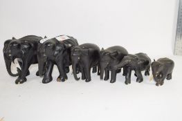 GROUP OF CARVED WOODEN ELEPHANTS