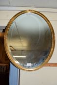 OVAL MIRROR IN GILT FRAME