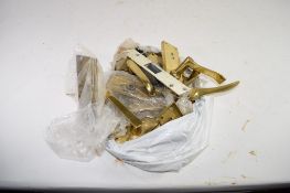 PLASTIC BAG CINTAINING QTY OF BRASS DOOR FITTINGS