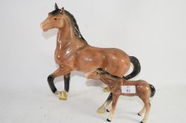 PAIR OF MELBA WARE HORSES