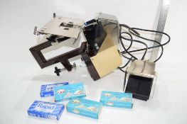 BOX CONTAINING HEAVY DUTY STAPLING MACHINE