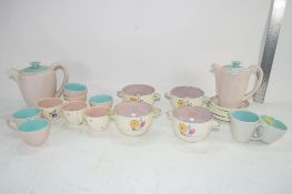 POOLE POTTERY TEA SET COMPRISING OF TEAPOT, COFFEE POT, SMALL BOWLS AND CUPS AND SAUCERS