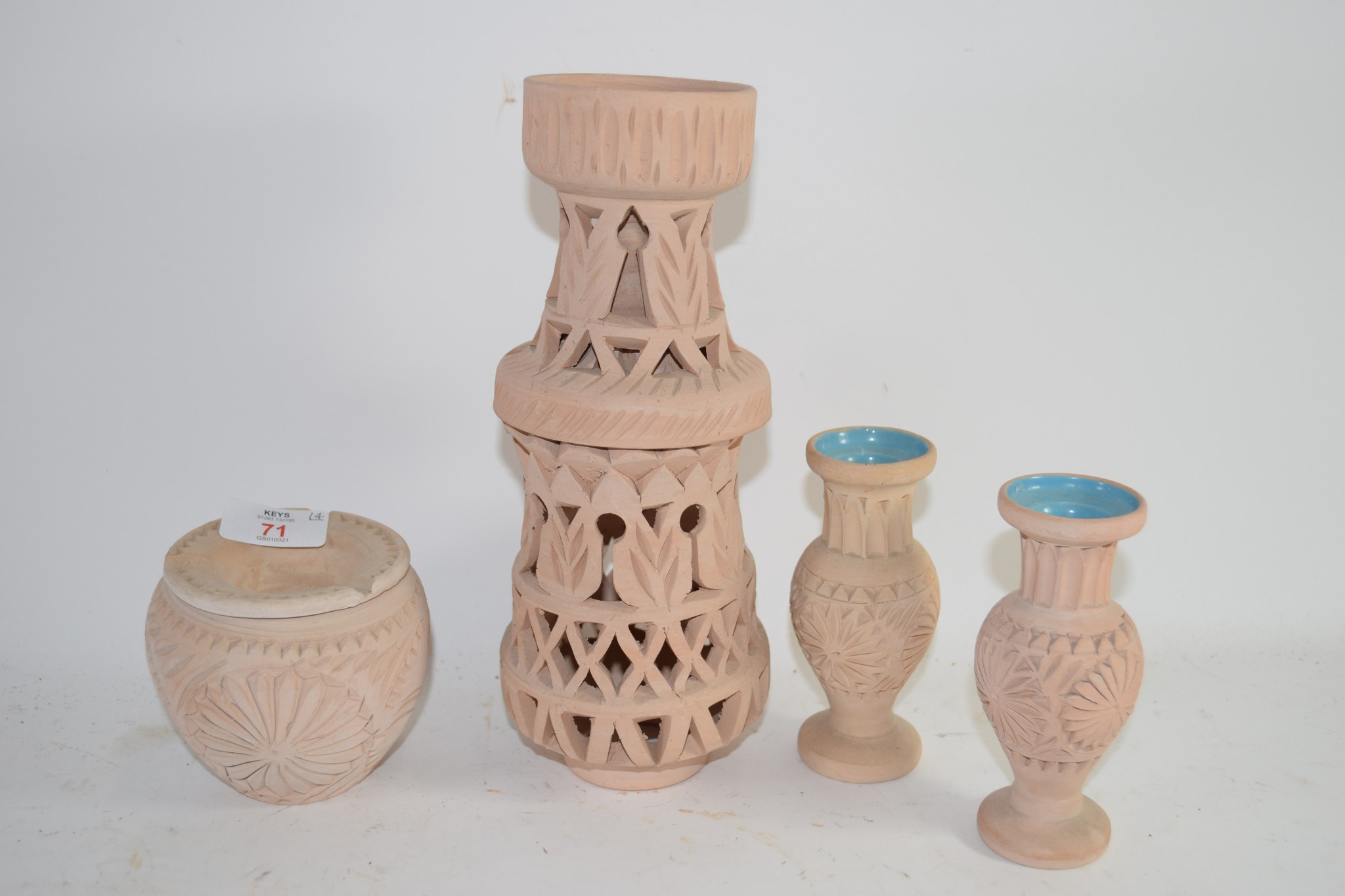 GROUP OF POTTERY PEIRCED VASES