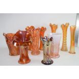 GROUP OF CARNIVAL GLASS VASES OF VARIOUS DESIGNS