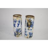 TWO SMALL ORIENTAL CYLINDRICAL VASES WITH BLUE AND WHITE DESIGN