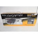 BOXED TOY MODEL OF A HELCOPTER WITH CONTROL KIT