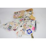 SMALL PLASTIC BAG CONTAINING A QTY OF STAMPS