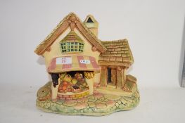 RESIN MODEL OF A HOUSE AND WISHING WELL