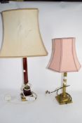 TWO TABLE LAMPS WITH SHADES ONE WITH WOODEN MOUNTS THE OTHER WITH CORINTHIAN COLUMN