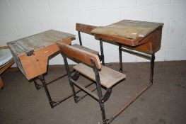 TWO METAL FRAMED SCHOOL DESKS WITH INTEGRAL CHAIR WIDTH APPROX 57CM MAX