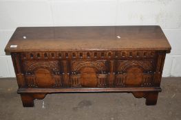 NARROW STORAGE CHEST/BLANKET BOX WITH CARVED DECORATION TO THE FRONT LENGTH APPROX 99CM