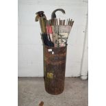 METAL STICK STAND WITH PAINTED FLORAL DECORATION CONTAINING AN ASSORTMENT OF VARIOUS PARASOLS,